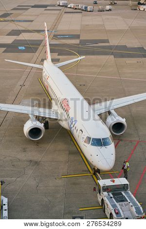 DUSSELDORF, GERMANY - CIRCA OCTOBER, 2018: an aircraft on pushback at Dusseldorf Airport.