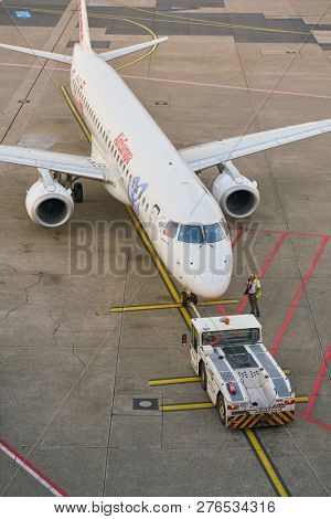 DUSSELDORF, GERMANY - CIRCA OCTOBER, 2018: an aircraft on pushback at Dusseldorf Airport.