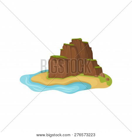 Small Sandy Island Surrounded By Water. Brown Mountain Slopes With Grass On Tops. Natural Landscape.