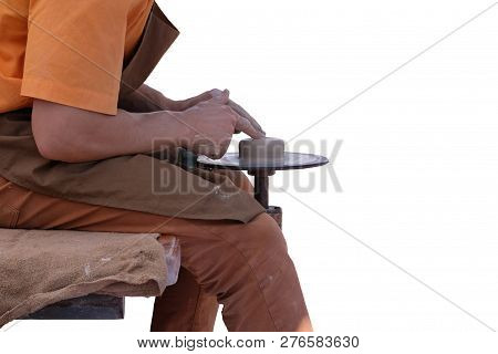 Potter Uses A Tool For Create Ceramic Pot. Pottery And Craftsmanship Concept.  Isolated On White Bac