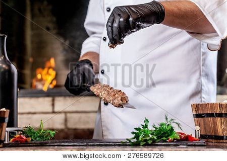 The Concept Of Georgian Cuisine. Recipe For Cooking Meat Lyulya Kebab In The Dough On The Grill. Che