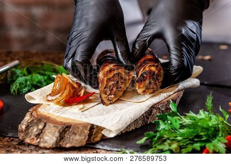 The Concept Of Georgian Cuisine. Recipe For Cooking Meat Lyulya Kebab In The Dough On The Grill. Che