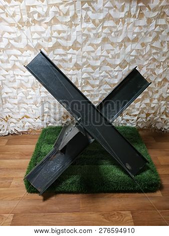 Black Steel Barrier In Shape Of Anti-tank Czech Hedgehog