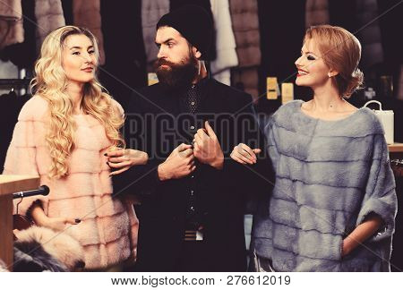 Friends In Shop: Ladies And Gentleman In Expensive Overcoats. Fashion And Shopping Concept. Man And 