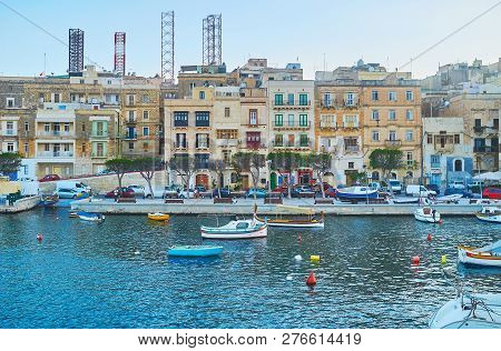 Senglea, Malta - June 18, 2018: The Limestone Edifices Of The Old Town With Colorful Wooden Balconie