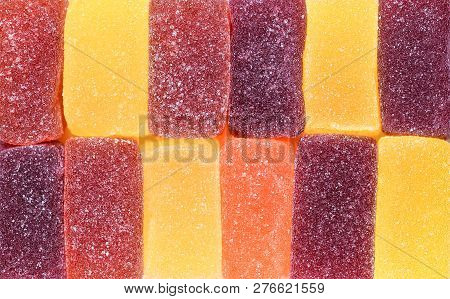 Marmalade Sweets Background. Gelly Candies Close Up. Colorful Swets. Jelly Cubes Sprinkled With Suga