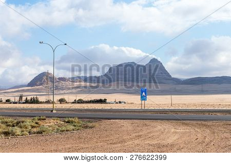 Maan, Jordan, December 07, 2018 : Intercity Route Passing Near The Foot Of The Red Mountains In The 