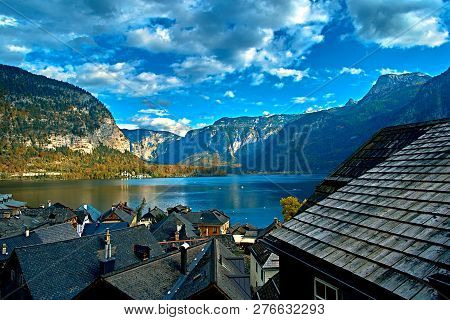 Beautiful Scenic View In Austrian Alps. Hallstatt Mountain Village At Hallstatt Lake. Sunny Day Lake