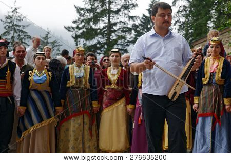 SUMELA MONASTERY, TRABZON, TURKEY - AUGUST 15, 2008: Greek musician and dancers during the celebration of Dormition of the Mother of God. The Greeks were expelled from Turkey in 1923