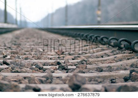 Low Side Shot Of Rail Rails. Defocused To Infinity Railway.