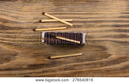 Matches With Gray And Burnt Match On The Verge Of A Matchbox