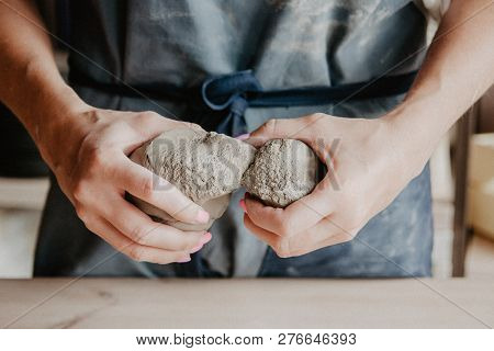 Pottery, Clay, Ceramics Art Concept - Closeup On Hands Of Young Master With The Large Pieces Of Fire