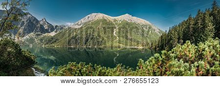 Tatra National Park, Poland. Panorama Famous Mountains Lake Morskie Oko Or Sea Eye Lake In Summer Mo