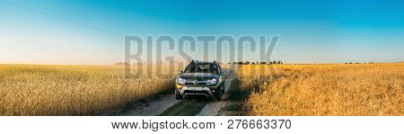 Gomel, Belarus - June 21, 2018: Renault Duster Or Dacia Duster Suv In Summer Wheat Field Countryside