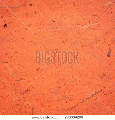background of sienna Thai banana paper with heavy banana bark inclusions