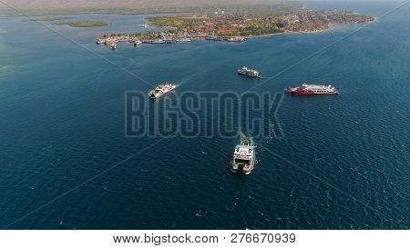 Aerial View Ferry Port Gilimanuk With Ferry Boats, Vehicles. Ferries Transport Vehicles And Passenge