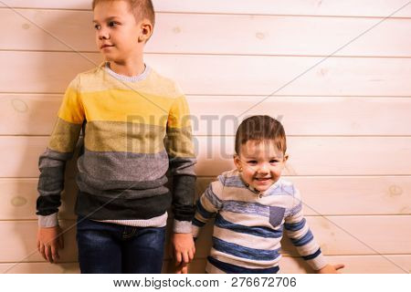 Two Brothers - The Elder Brother And The Younger Brother, Talking In The House Against The Backgroun