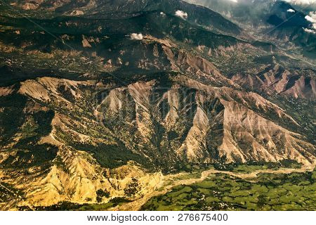 Aerial View Of Himalayan Mountains Of Ladakh, Green Landscape With Mountain Peaks And Indus River Fl