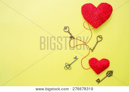 14 February, Keys With The Heart As A Symbol Of Love. Greeting Card With Red Heart On Yellow Backgro