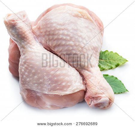 Raw chicken legs isolated on white background.