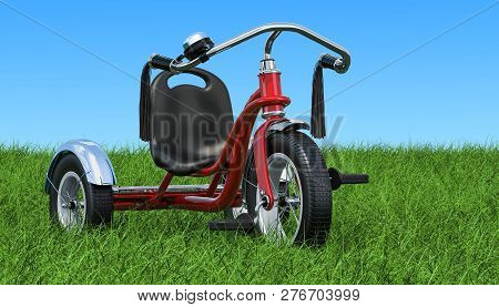 Children's Tricycle On The Green Grass Against Blue Sky, 3D Rendering