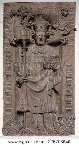 BRESSANONE, ITALY - JULY 14, 2018: A memorial tablet on the portal of the Cathedral of Santa Maria Assunta i San Cassiano in Bressanone, Italy