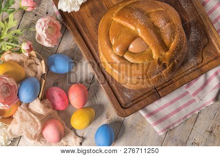 Portuguese Traditional Easter Cake. Folar With Eggs On Wooden Table