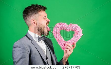 Hipster Hold Heart Symbol Love. Bring Love To Family Holiday. Romantic Surprise. Man In Love Strict 
