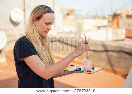 Young Woman Paint Artist Drawing At Home Roof