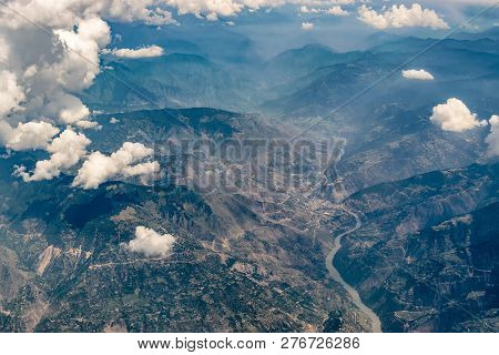 Aerial View Of Himalayan Mountains Of Ladakh, Green Landscape With Mountain Peaks And Indus River Fl