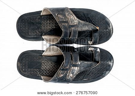 Close Up Of Black Colored Slippers Or Chapals Or Flip Flops Isolated On White Used By Common Male Ci