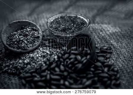 Home Remedy To Cure Lice Or Joon On Brown Colored Surface I.e. Custard Apple Seeds Dried And Powdere