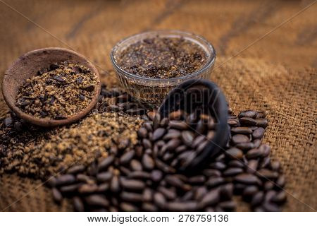 Home Remedy To Cure Lice Or Joon On Brown Colored Surface I.e. Custard Apple Seeds Dried And Powdere