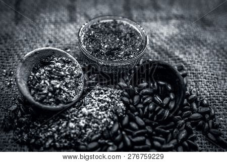 Home Remedy To Cure Lice Or Joon On Brown Colored Surface I.e. Custard Apple Seeds Dried And Powdere