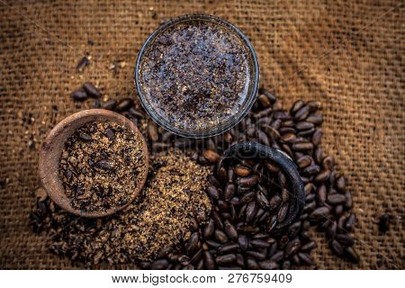 Home Remedy To Cure Lice Or Joon On Brown Colored Surface I.e. Custard Apple Seeds Dried And Powdere