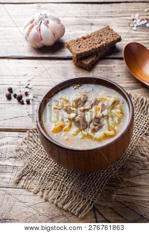 Kharcho Soup With Meat And Rice On Wooden Table