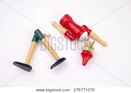Toy Puppet Broken Pinocchio On White Background
