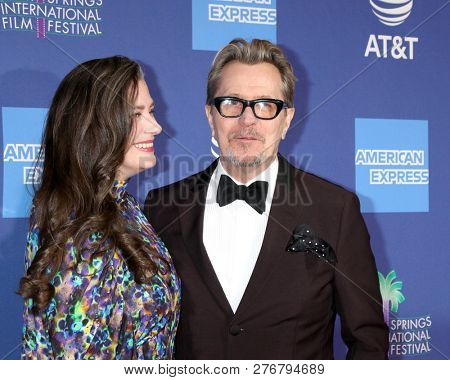 PALM SPRINGS - JAN 17:  Gisele Schmidt, Gary Oldman at the 30th Palm Springs International Film Festival Awards Gala at the Palm Springs Convention Center on January 17, 2019 in Palm Springs, CA