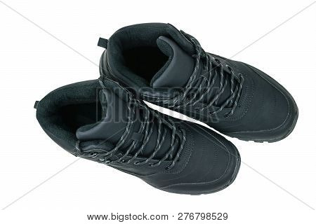 A Pair Of Mens Sports Insulated Boots Isolated On White Background. The View From The Top.