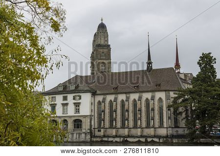 Zurich, Switzerland - Oct 130th, 2018: View Of Grossmunster And Zurich Old Town From Limmat River. T