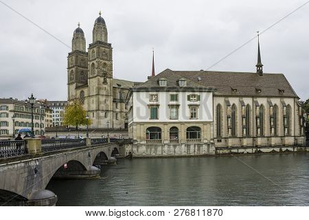 Zurich, Switzerland - Oct 130th, 2018: View Of Grossmunster And Zurich Old Town From Limmat River. T