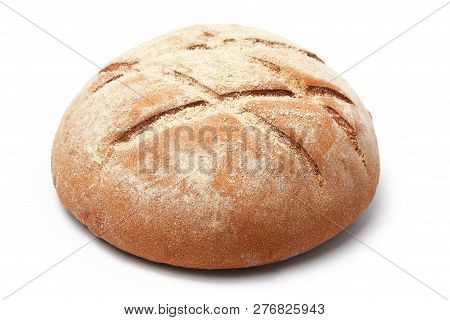 Loaf Of Bread Of Round Shape With A Pattern On A White Background