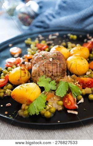 Beef meat stewed with potatoes-Traditional French cuisine Beef Bourguignon potatoes carrots in persillade