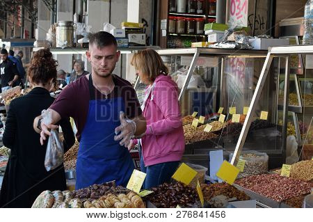 Athens, Greece - October 17, 2018: Vendors And Customers At Dried Fruit And Nuts Market On Athinas S