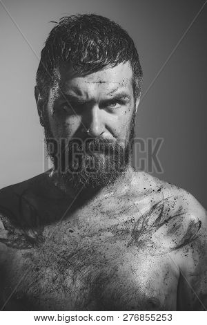 Bearded Man With Tattoo On Chest Skin. Hipster With Beard, Mustache On Dirty Face. Wizard, Sorcerer,