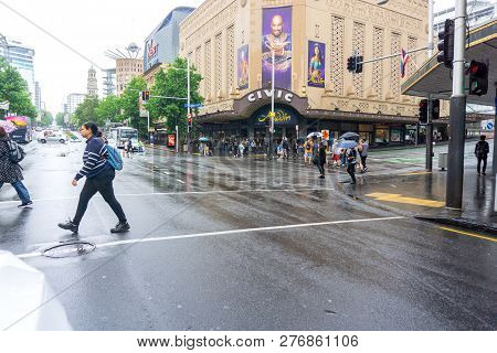 Auckland New Zealand - December 23 2018; People Cross Queen Street And Wellesley Street Intersection