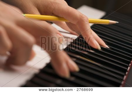 Woman'S Fingers On Digital Piano Keys