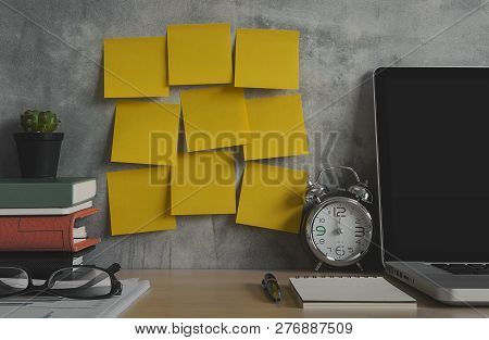 Resolutions, Notes, Goals, Post, Memo Or Action Plan Concept. Sticky Notes On Loft Wall In Workplace