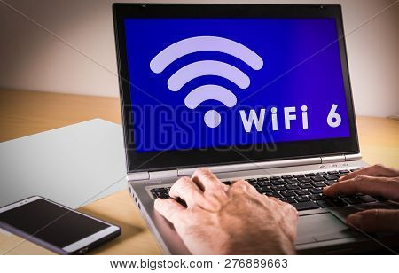 Laptop With New Wifi 6 On The Screen.