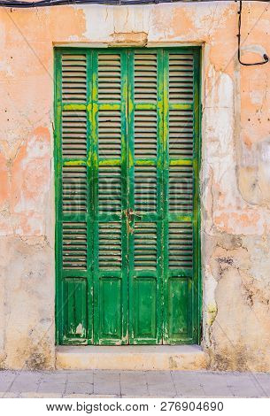 Old Green Wood Front Door Of Mediterranean House